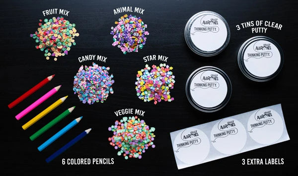 Includes: 3 tins of clear Thinking Putty, 6 colored pencils, 6 tin labels, and 5 bags of mix-in pieces.