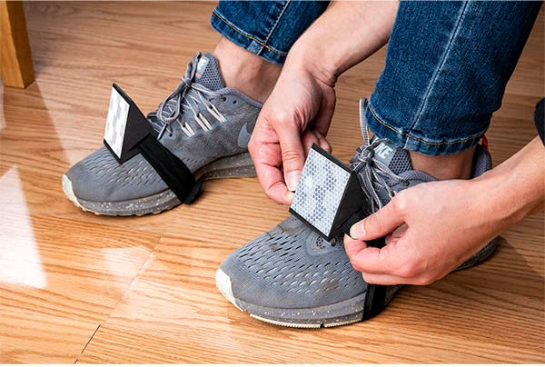 Attach the included foot pedal reflectors to your feet.