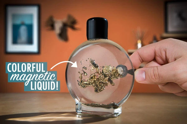Colorful Gold Ferrofluid on a desk.