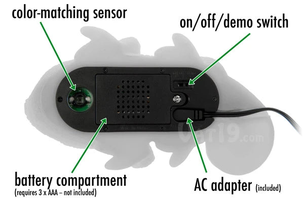 The underside of Huey features its color-matching sensor, mode switch, battery compartment, and AC adapter terminal.
