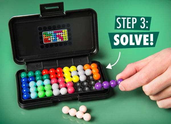 Fill the board completely using the remaining pieces in order to solve the Kanoodle.