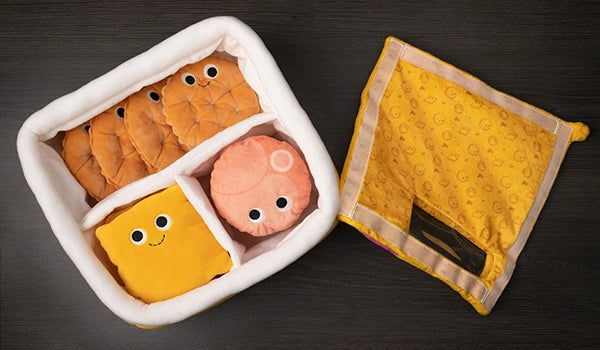 Store all your plush friends inside the plush lunch box which features a velcro flap and vinyl window.