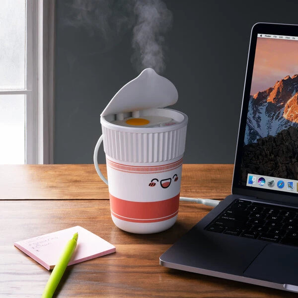 Fill it with water and it produces a cool mist that will remind you of a cozy cup of steaming noodles.