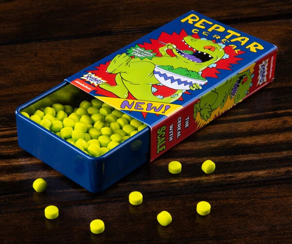 This rad novelty tin looks just like the Reptar Cereal that Tommy Pickles craved!