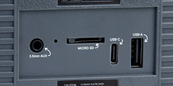 In addition to USB and micro SD inputs, you've also got a 3.5mm AUX port.