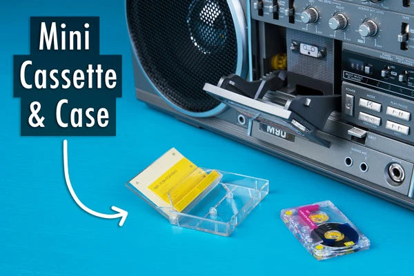 The mini replica cassette tape (with case) spins realistically during use.