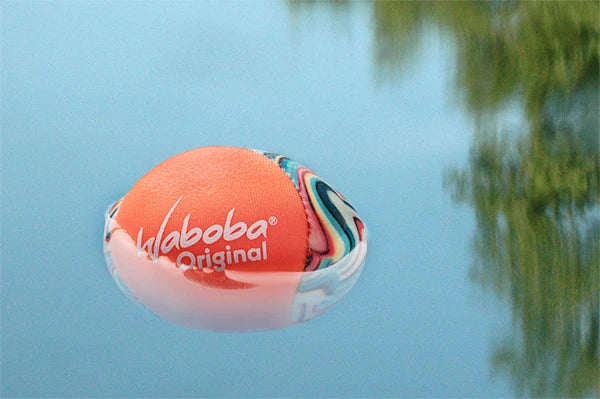 In addition to bouncing five to six feet off the water, the brightly colored Waboba Ball also floats.