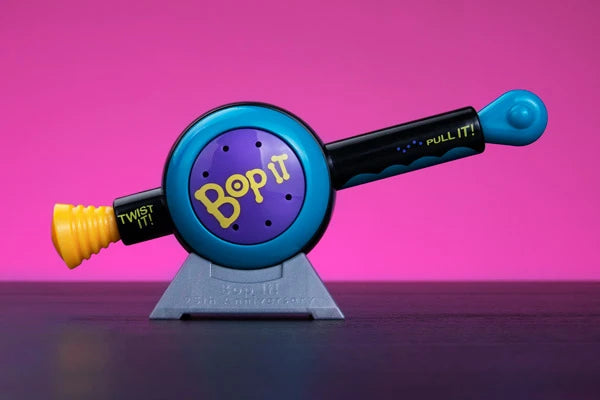 When not playing, use the included stand to display your World's Smallest Bop It!