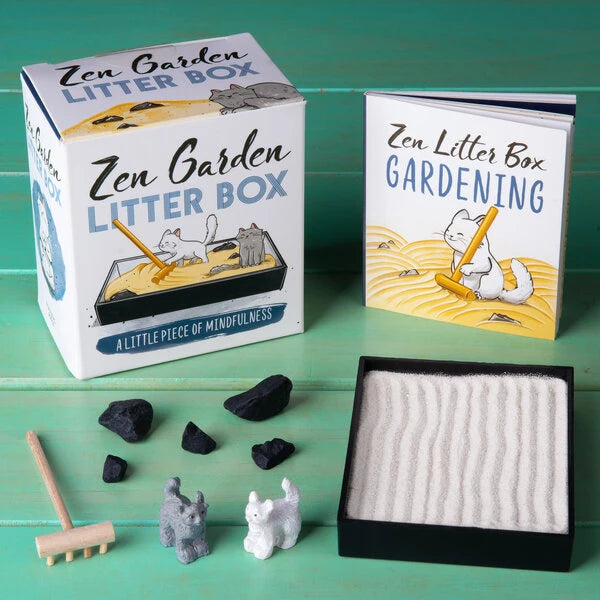Includes: bag of sand, 5 decorative rocks, wooden rake, and a mini-book on the Zen of litter box gardening (in English).