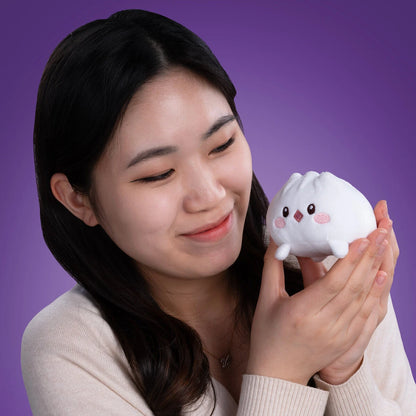 This little cutie adds a playful twist to your plush collection.