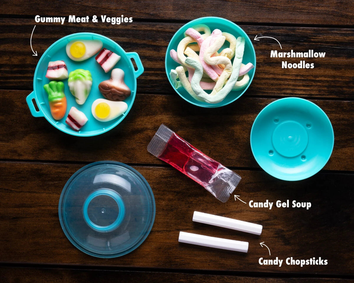 The set includes gummy "meat and veggies", marshmallow "noodles", a sour gel "soup", and candy chopsticks.