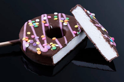 Marshmallow on a stick shaped like a donut, enrobed in chocolate, and drizzled with more deliciousness!