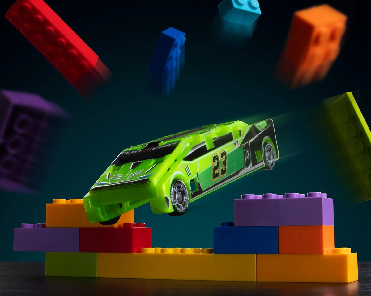 Transform your floor, table top, or counter into a racetrack, or try propping up a book and see how far you can ramp!