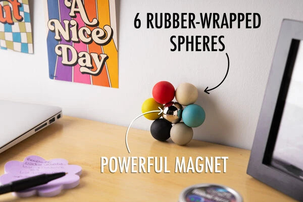 Each set includes six rubber-wrapped metal spheres and one powerful magnet.