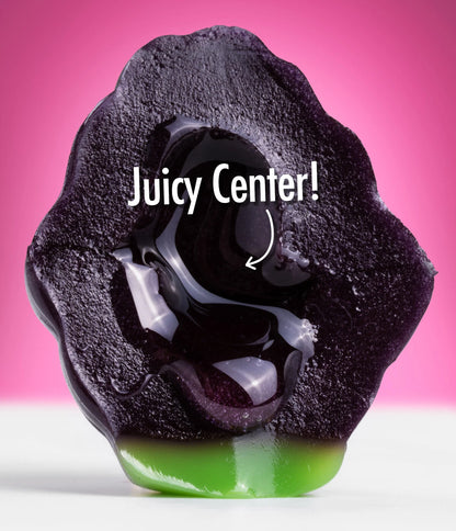 Individually packaged chewy grape candies with a liquid candy filling.