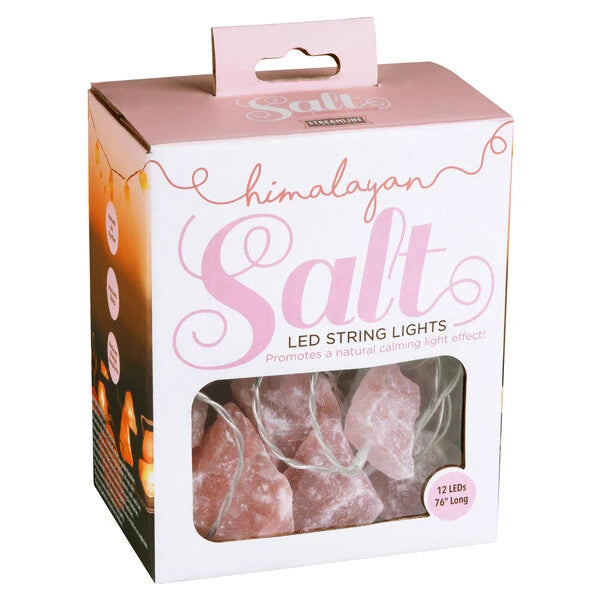 Twelve string lights encased in pink-tinted Himalayan salt.