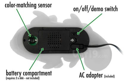 The underside of Huey features its color-matching sensor, mode switch, battery compartment, and AC adapter terminal.