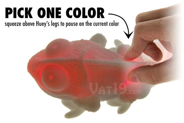 Hold the current color by squeezing the small switch above Huey's hind legs.