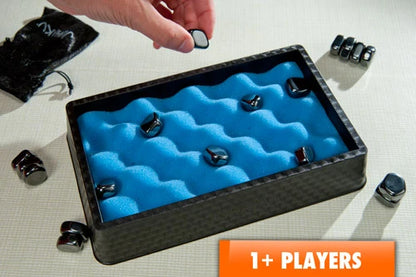 In Jishaku, your goal is to place all of your magnetic stones on the board without any of them touching. It's much harder than it looks.