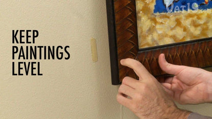 Keep your artwork and picture frames hanging true and straight with a small piece of Joe's Sticky Stuff™.