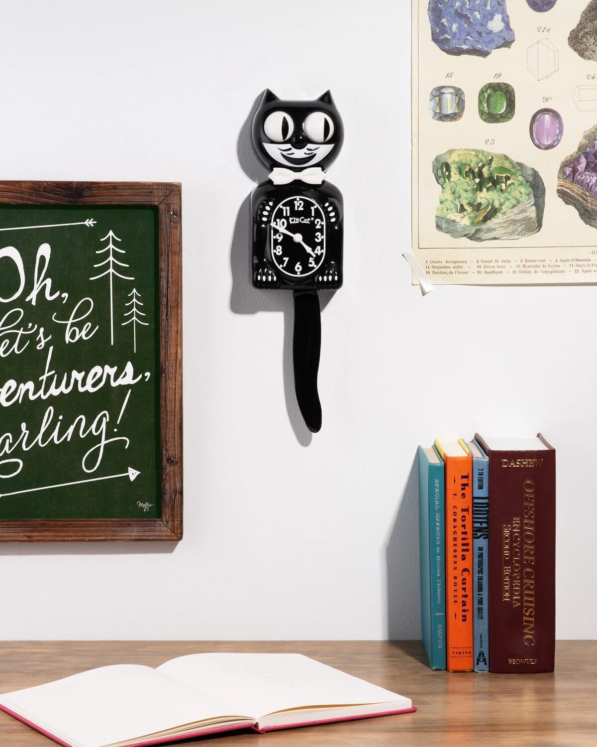With its pendulum tail and swiveling eyes, this Art Deco novelty adds a not-so-retro appeal to any room!