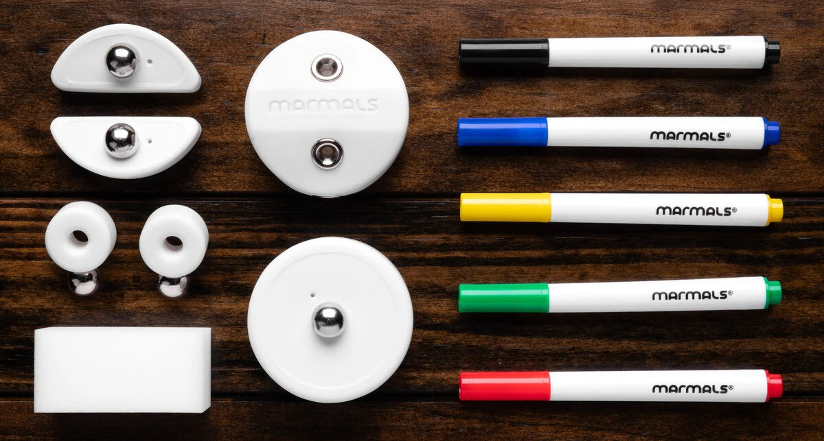 Includes: 1 figure, 5 washable markers, and 1 eraser block.