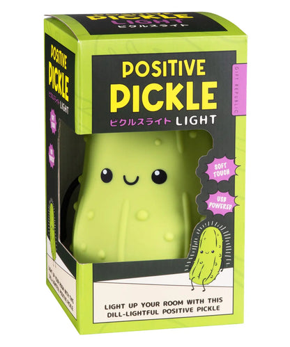 A squeezable lamp styled like a happy pickle.