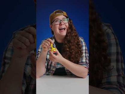 Sloane demonstrates the Mini Baby Shark Otamatone.