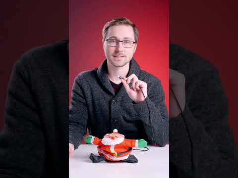 Daniel demonstrates the Desktop Inflatable Santa.