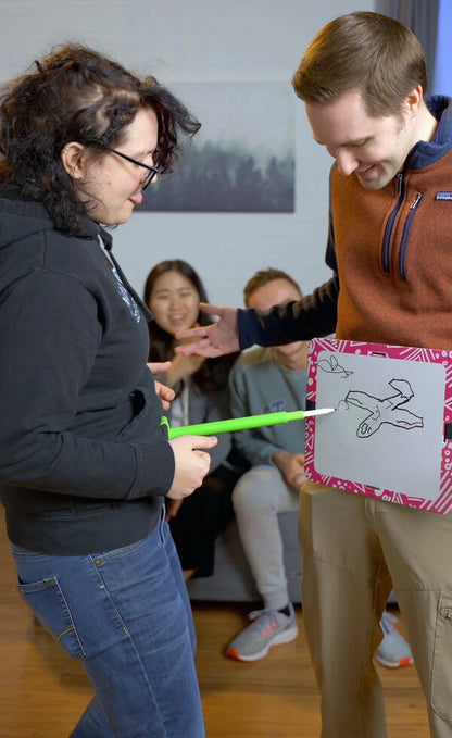 A party game where you draw using your hips and someone else decides where the board goes!
